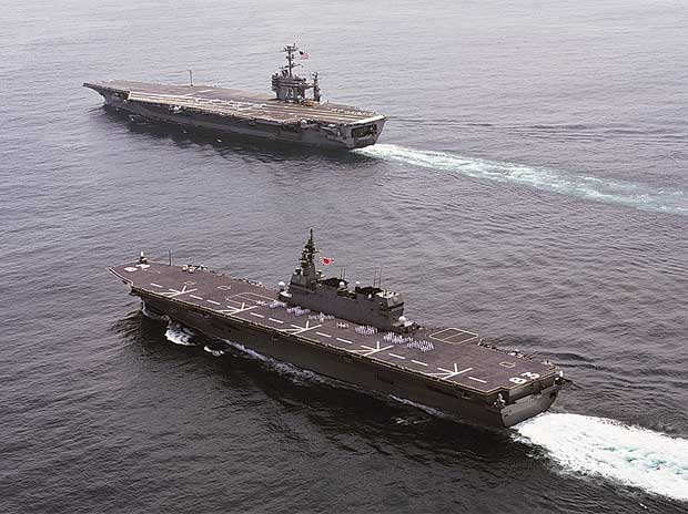 US warship near islands in disputed sea irks China